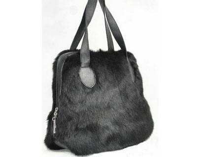 Offering fur leather handbag
